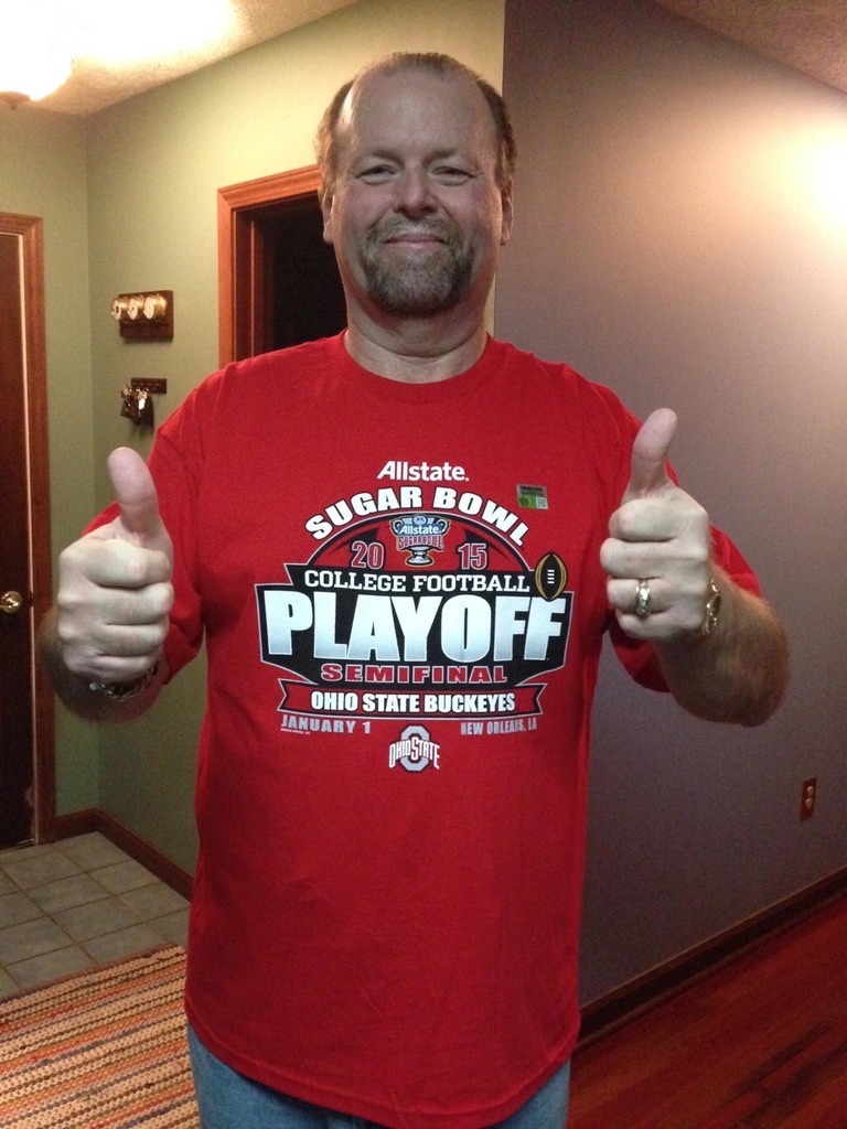 Joby Horn wearing an Ohio State shirt and giving two thumbs up
