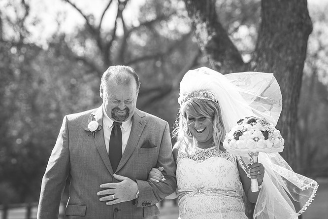 Joby Horn walking Stephanie Werner down the aisle on her wedding day